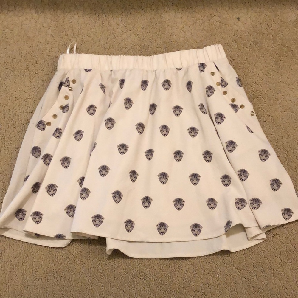 BP collections tan skirt with studs and cheetahs